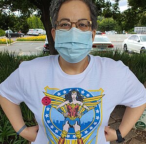 Breast cancer fighter Anita shows off one of her many superhero shirts. Here you can see Wonder Woman. Breast cancer fighter Anita shows off one of her many superhero shirts. Here you can see Wonder Woman.
